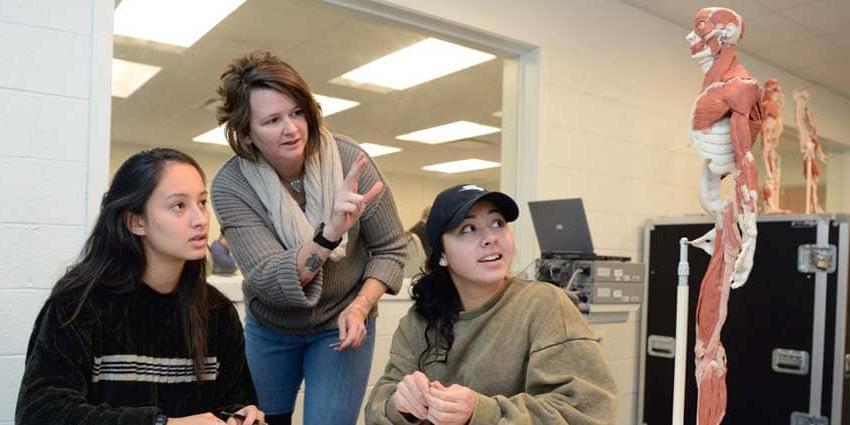 students and instructor at UB, home to a top health science degree program